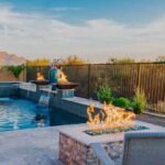 How a Custom Pool Company Incorporates Fire and Water Features into Pool Designs