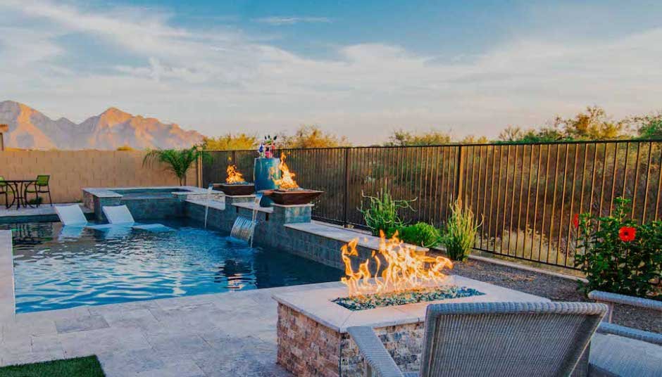 How a Custom Pool Company Incorporates Fire and Water Features into Pool Designs